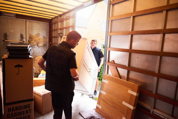 Furniture being wrapped in protective material by UAE movers