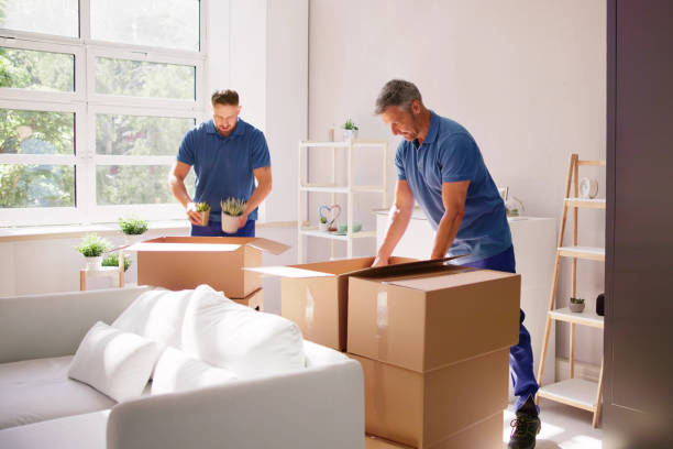 Moving crew loading a truck for a Sharjah house shifting job