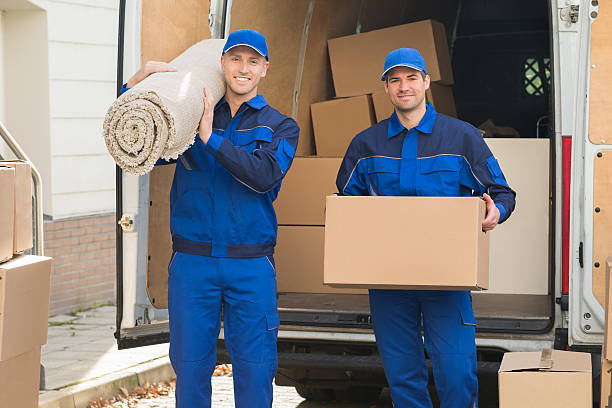 Office relocation team in the UAE packing files and equipment