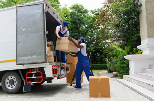 Office relocation team packing desks and equipment in a Business Bay Dubai office